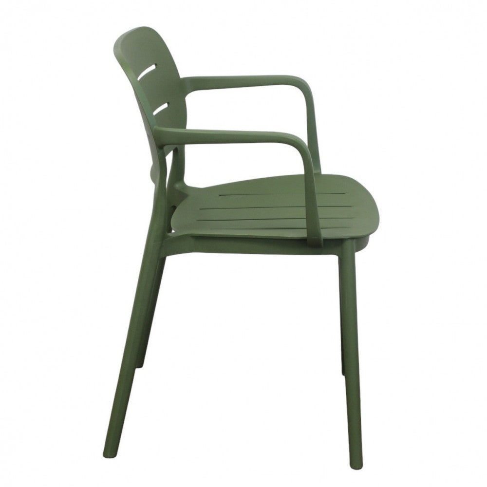 Profilo laterale della poltrona Giselle verde oliva, evidenziando l'inclinazione ergonomica dello schienale.