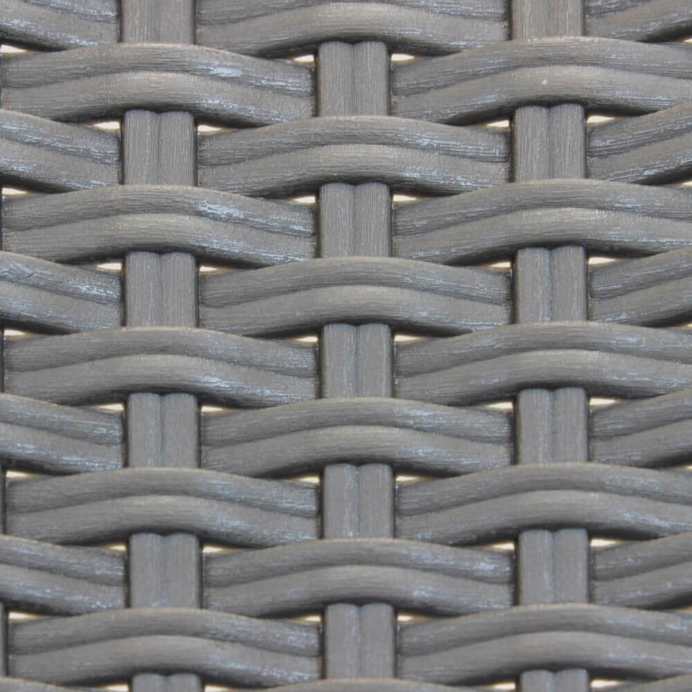 Macro fotografia della texture in wicker color taupe, che mostra la precisione dell'intreccio materico.
