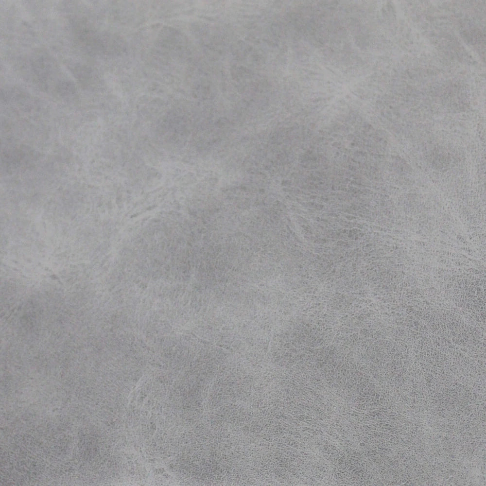 Poltrona Rosalyn in ecopelle color tortora, design moderno con struttura in metallo, particolare Imbottitura