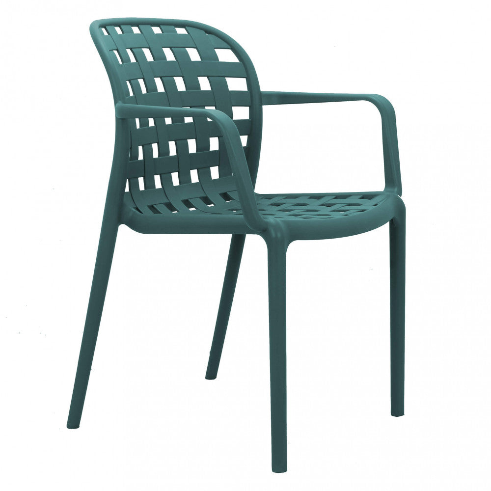 Vista di tre quarti della Poltrona Sharon verde su sfondo bianco, mettendo in risalto la struttura robusta e il design moderno.