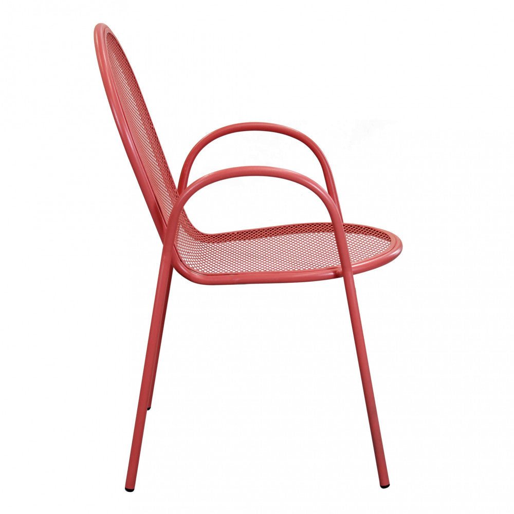 Profilo laterale della poltrona Sheffield in acciaio rosso corallo su sfondo bianco.