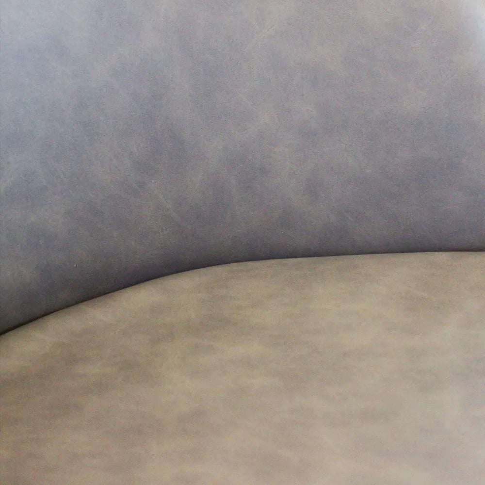 Poltrona Sissy in ecopelle marrone, design moderno per soggiorno o ufficio, particolare della seduta