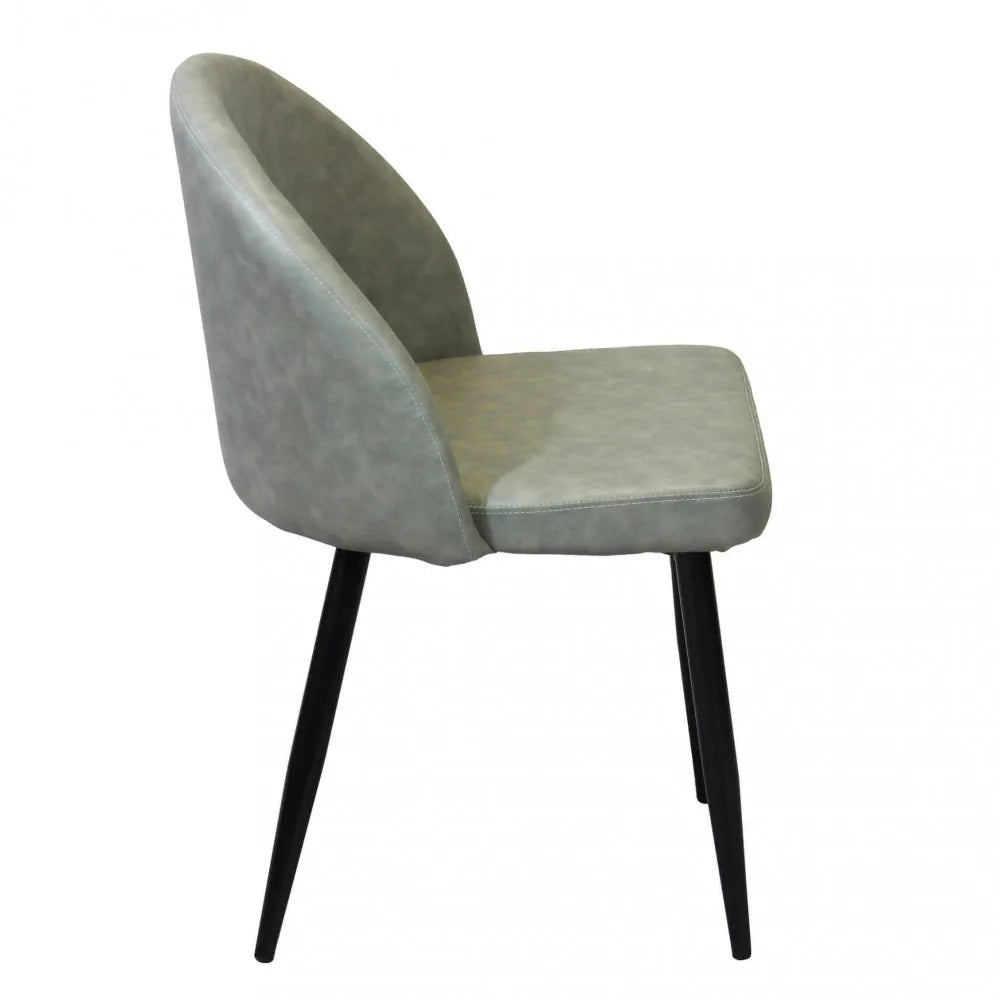 Poltrona Sissy in ecopelle color tortora, stile moderno con base in metallo, vista laterale