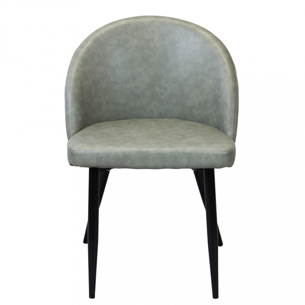 Vista frontale della poltrona Sissy senza braccioli, design moderno in ecopelle tortora.