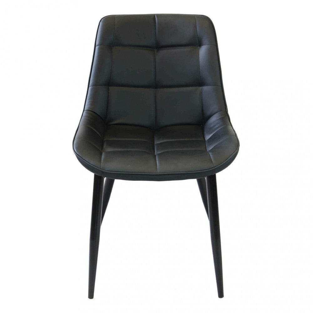 Vista frontale della poltrona moderna Winona, con focus sulla simmetria del design e lo schienale ergonomico.