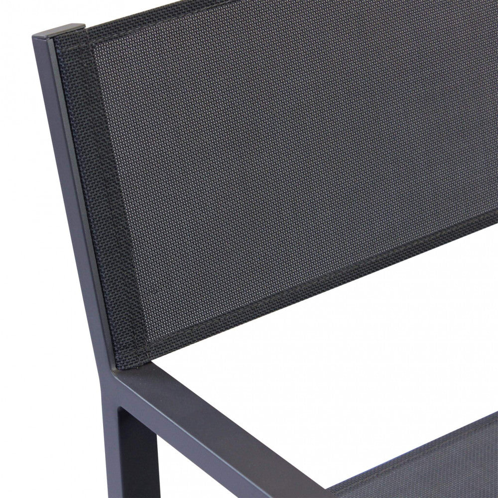 Poltrona Zante impilabile color antracite, con struttura in alluminio e seduta in textilene.