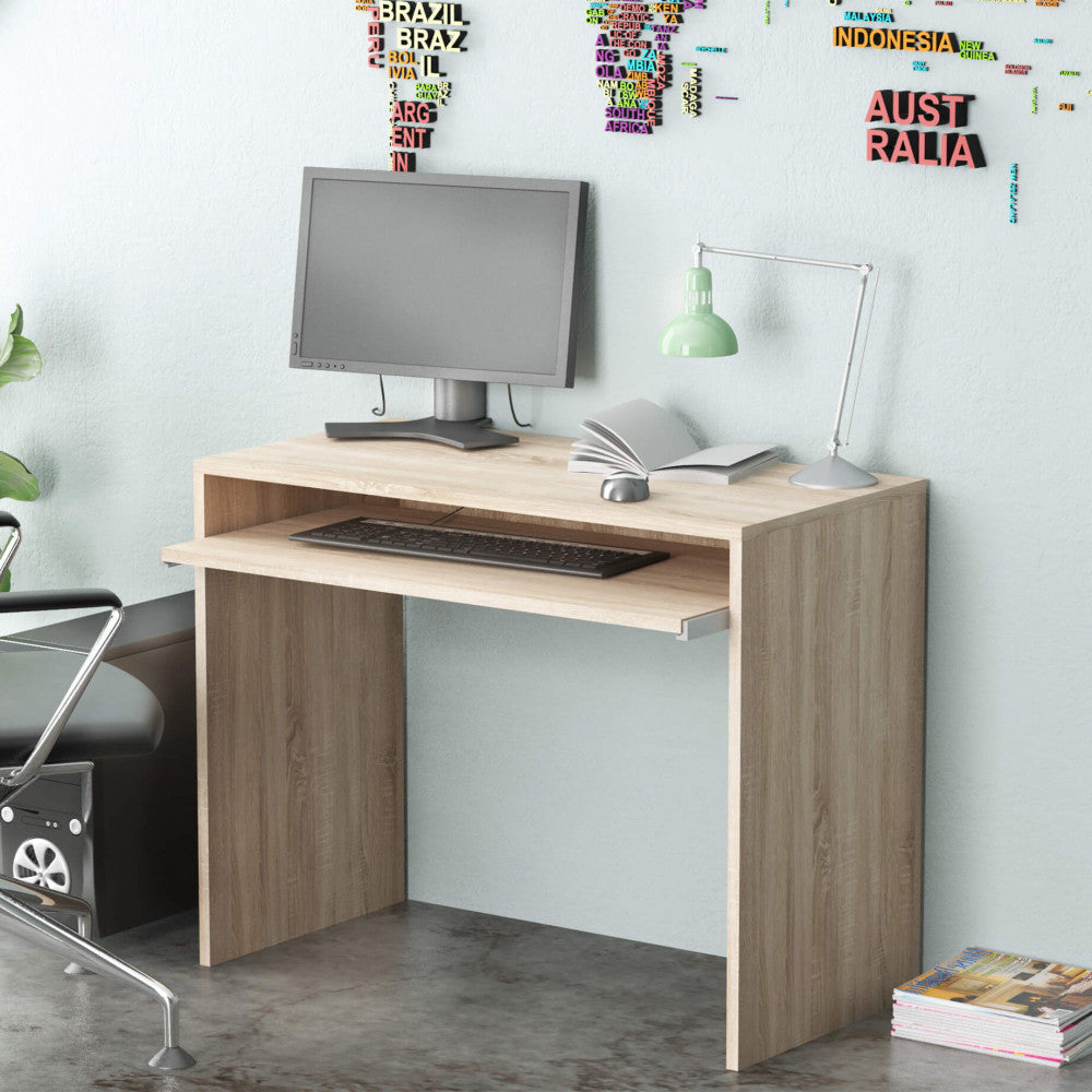 Scrivania Perry inserita in un angolo studio dal design contemporaneo con dettagli industriali.