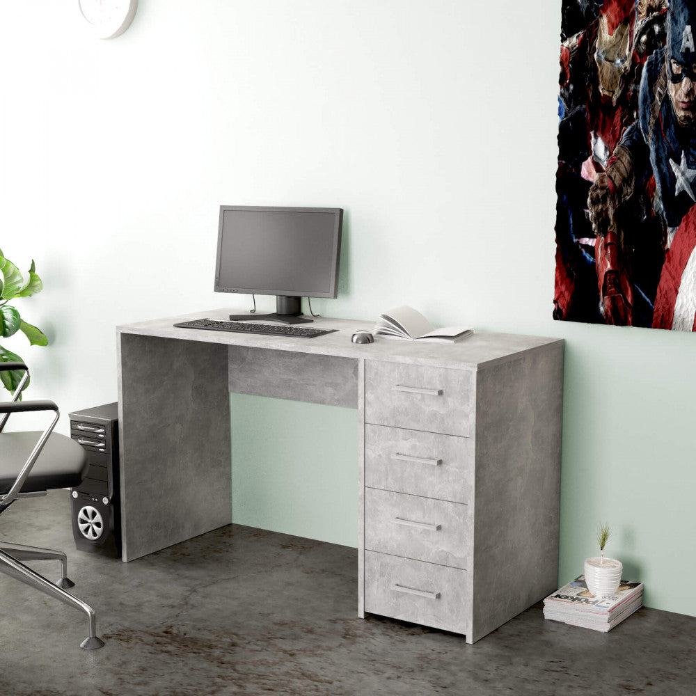 Scrivania Topaz utilizzata come postazione gaming o studio con monitor, sedia ergonomica nera e poster decorativo.