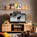Il Porta TV Sardinia ambientato in un ampio living, con televisore e elementi decorativi, sottolineando il suo impatto estetico e la funzionalità | Albert Stock