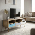 Porta TV Tiburg in MDF inserito in un luminoso salotto contemporaneo con divano beige e decorazioni minimaliste.