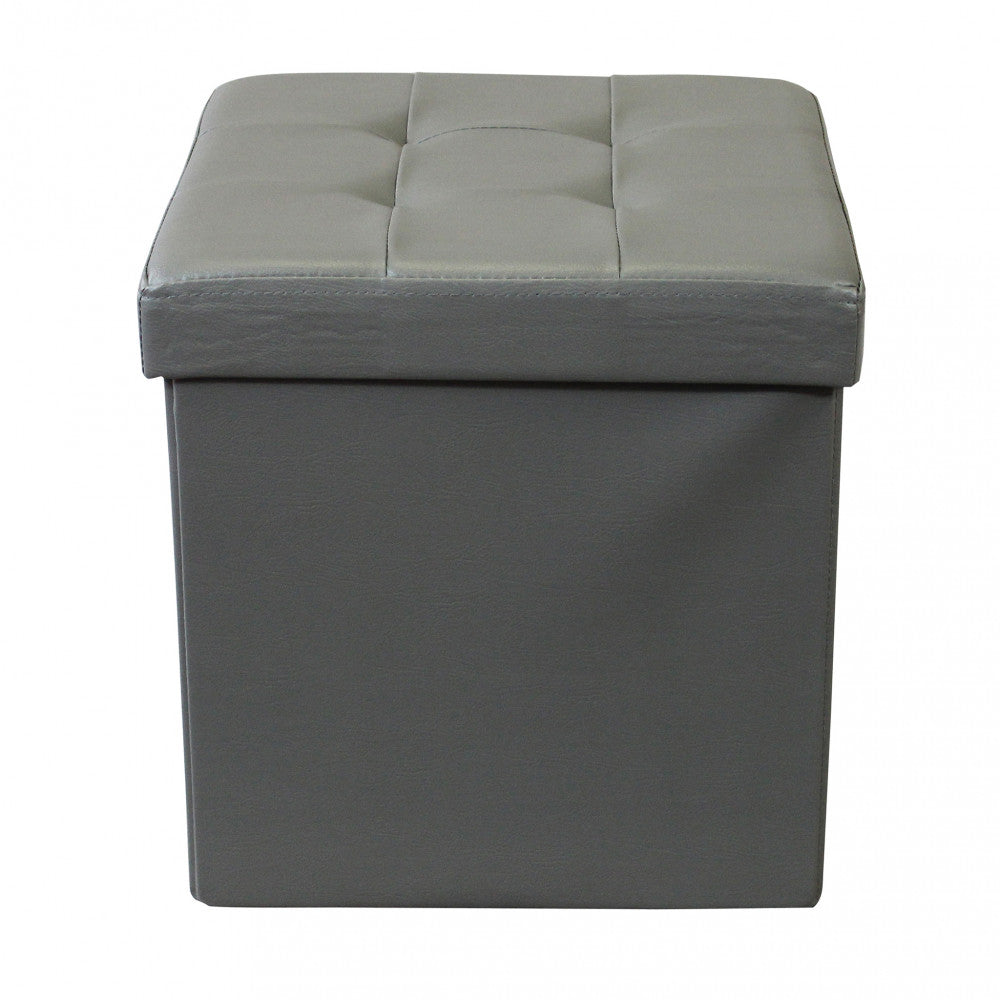 Dettaglio frontale del pouf contenitore quadrato in ecopelle grigio premium.