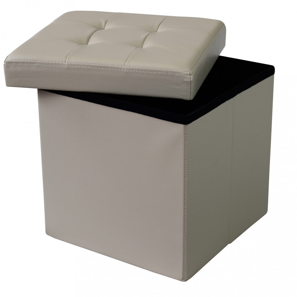 Pouf contenitore in ecopelle rosa pallido con coperchio parzialmente sollevato, mostrando il vano interno nero.