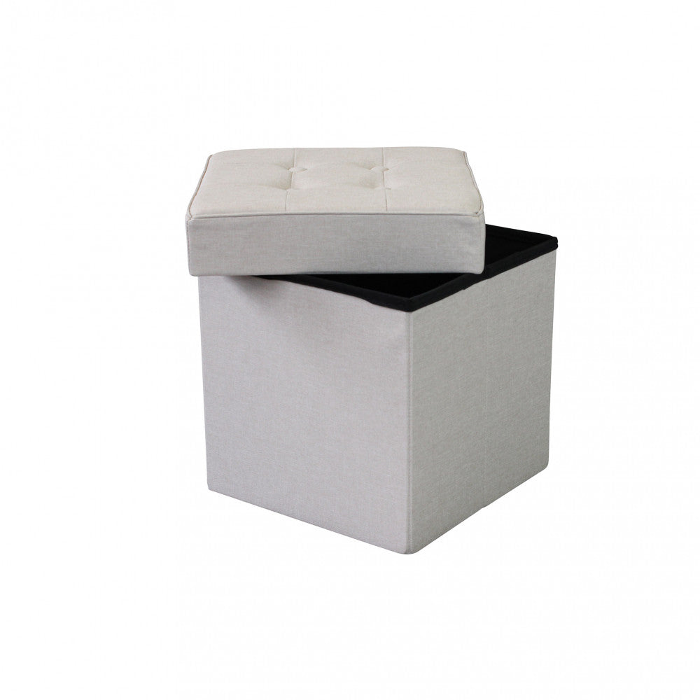 Pouf contenitore con coperchio parzialmente sollevato, rivelando il capiente vano interno nero.