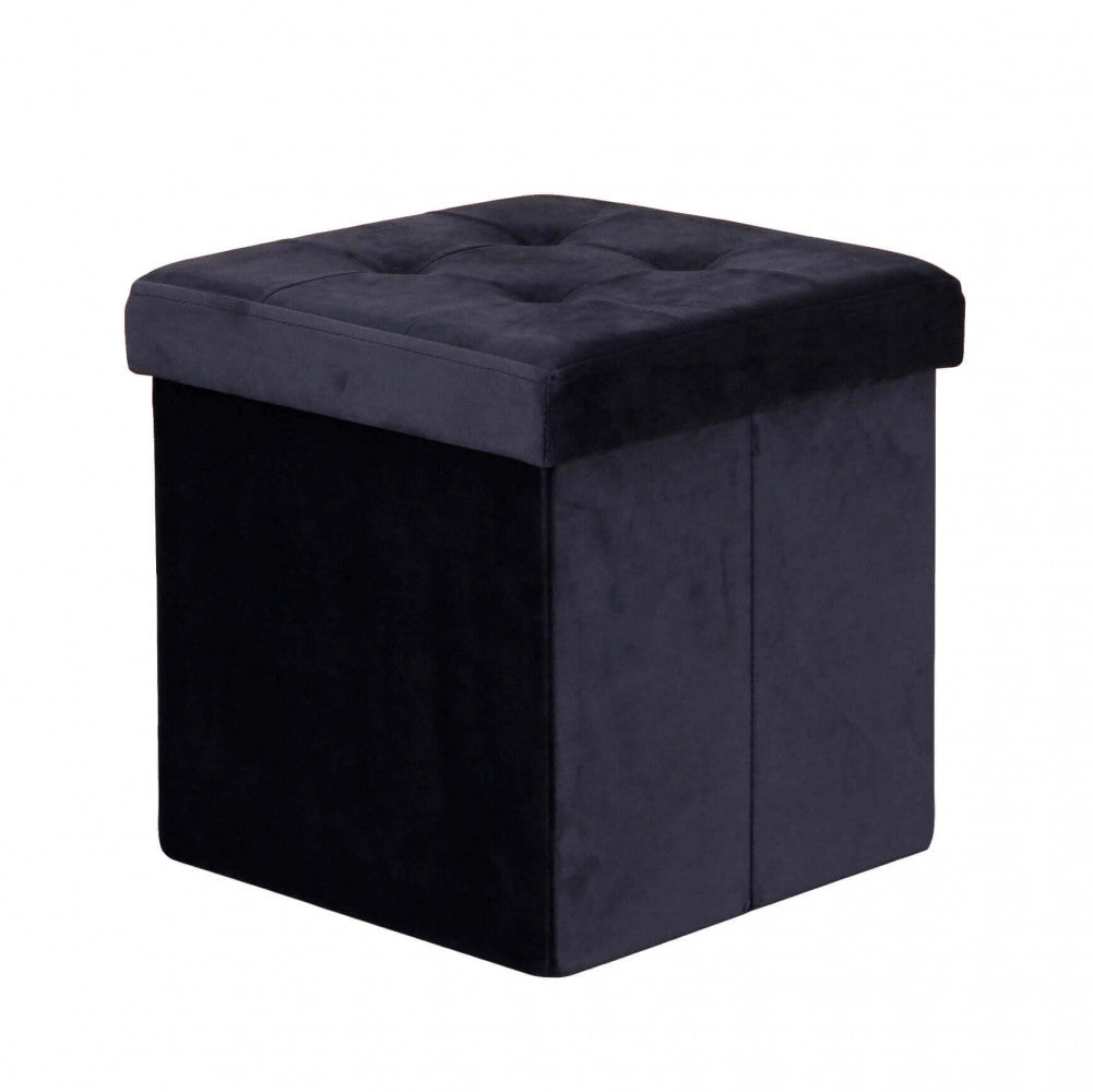 Vista frontale del pouf contenitore in velluto nero su sfondo bianco, che evidenzia la seduta trapuntata.
