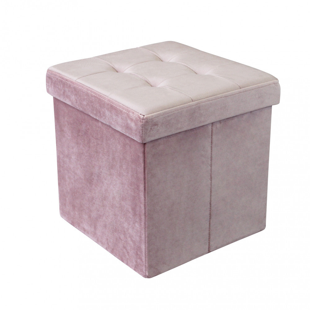 Vista angolare del pouf contenitore in velluto rosa su sfondo bianco, che evidenzia la seduta trapuntata.