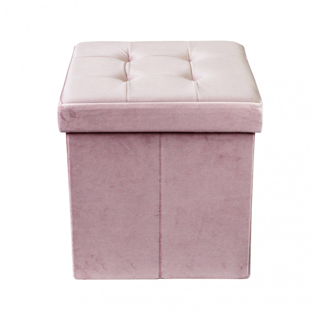 Vista frontale del pouf in velluto rosa, che mostra le cuciture verticali e la texture morbida.