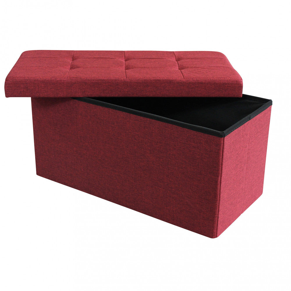 Pouf contenitore aperto, che mostra il coperchio sollevato e l'ampio vano interno rivestito in tessuto nero.
