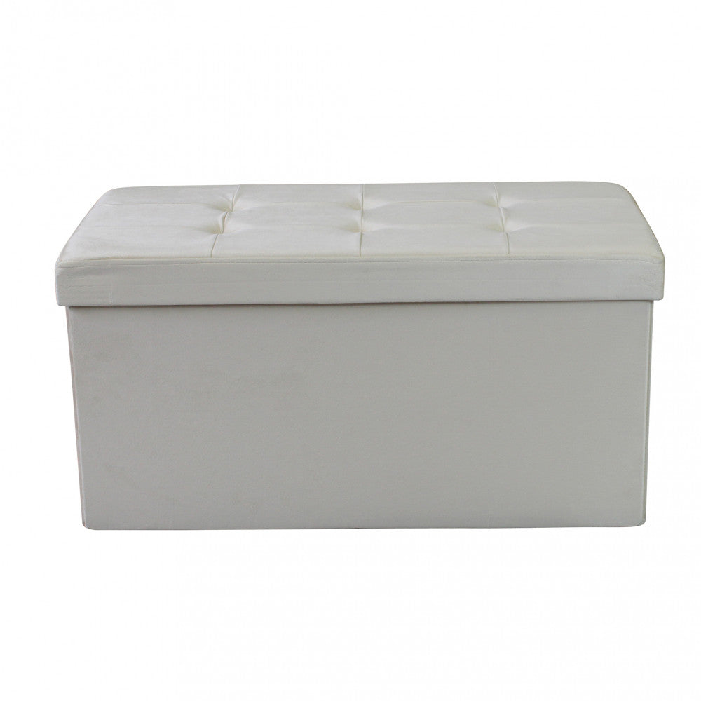 Vista frontale completa del pouf contenitore rettangolare chiuso in velluto beige.