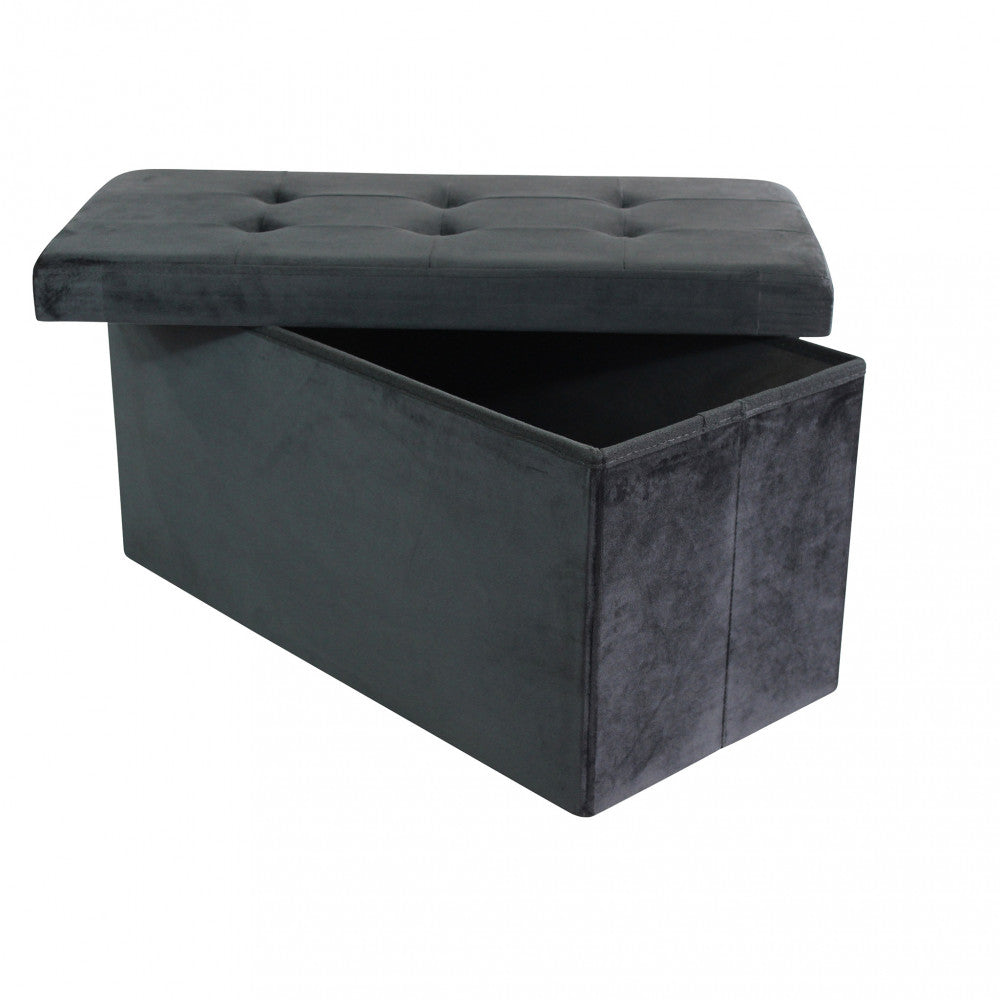 Pouf contenitore in velluto nero con coperchio parzialmente sollevato, che mostra l'ampio vano portaoggetti interno.