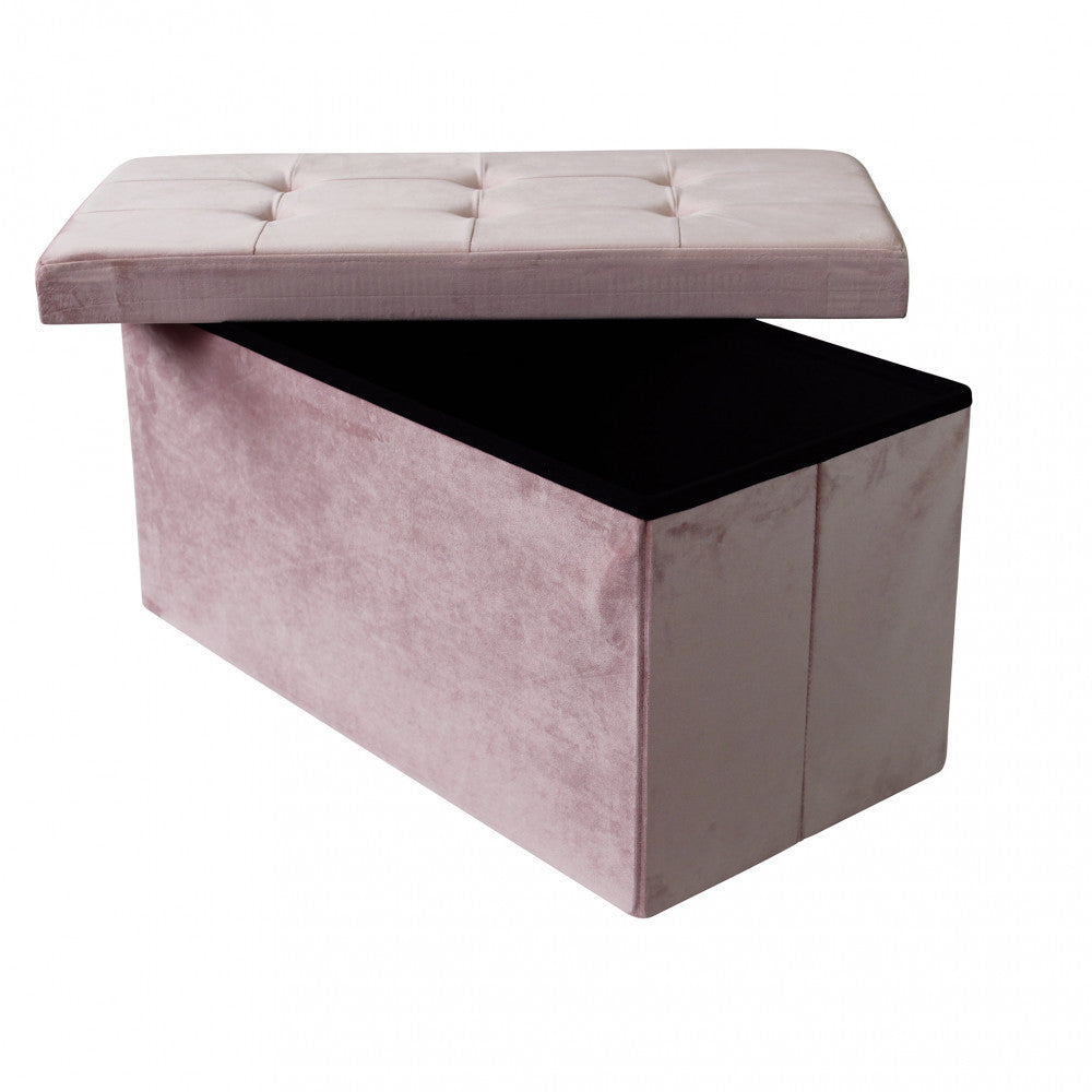 Pouf contenitore in velluto rosa con il coperchio parzialmente sollevato, mostrando l'ampio vano interno nero.