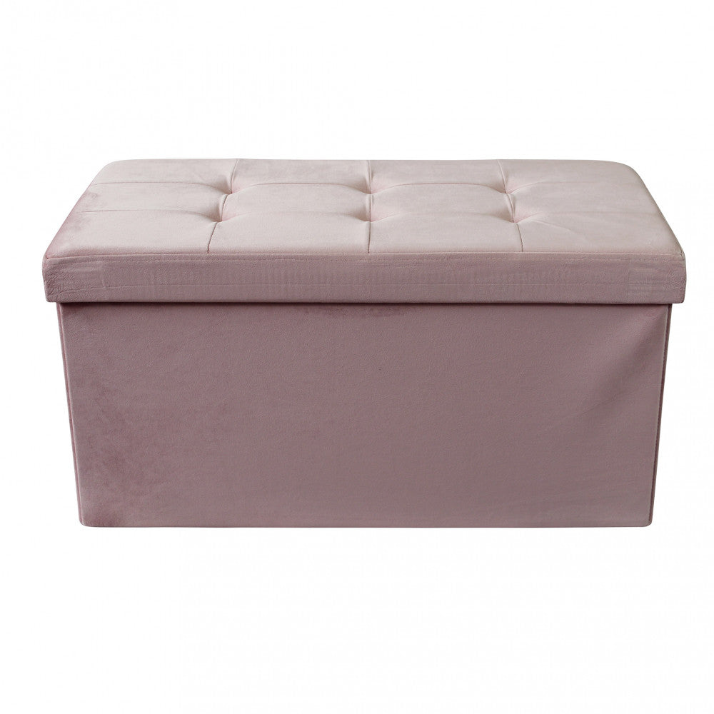 Vista frontale del pouf contenitore in velluto rosa, che mette in risalto la struttura solida e il design pulito.