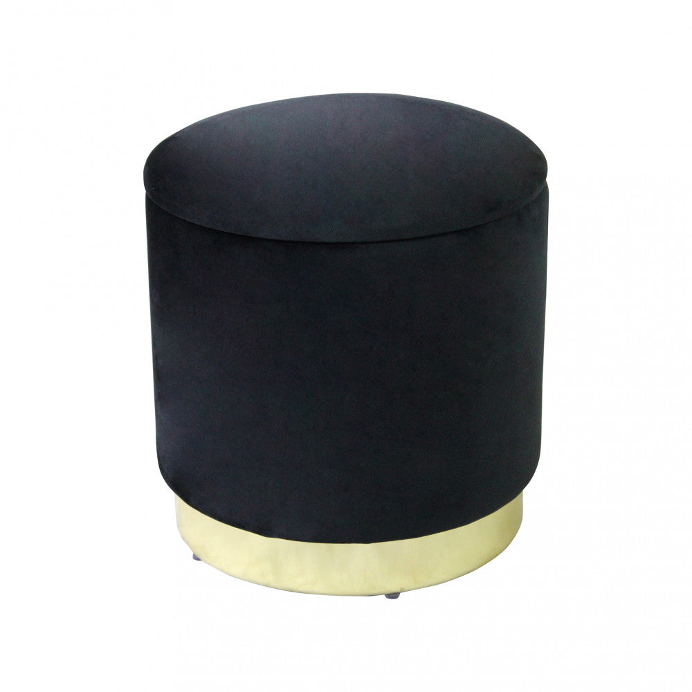 Vista frontale del pouf contenitore rotondo in velluto nero su sfondo bianco, evidenziando la base metallica dorata.