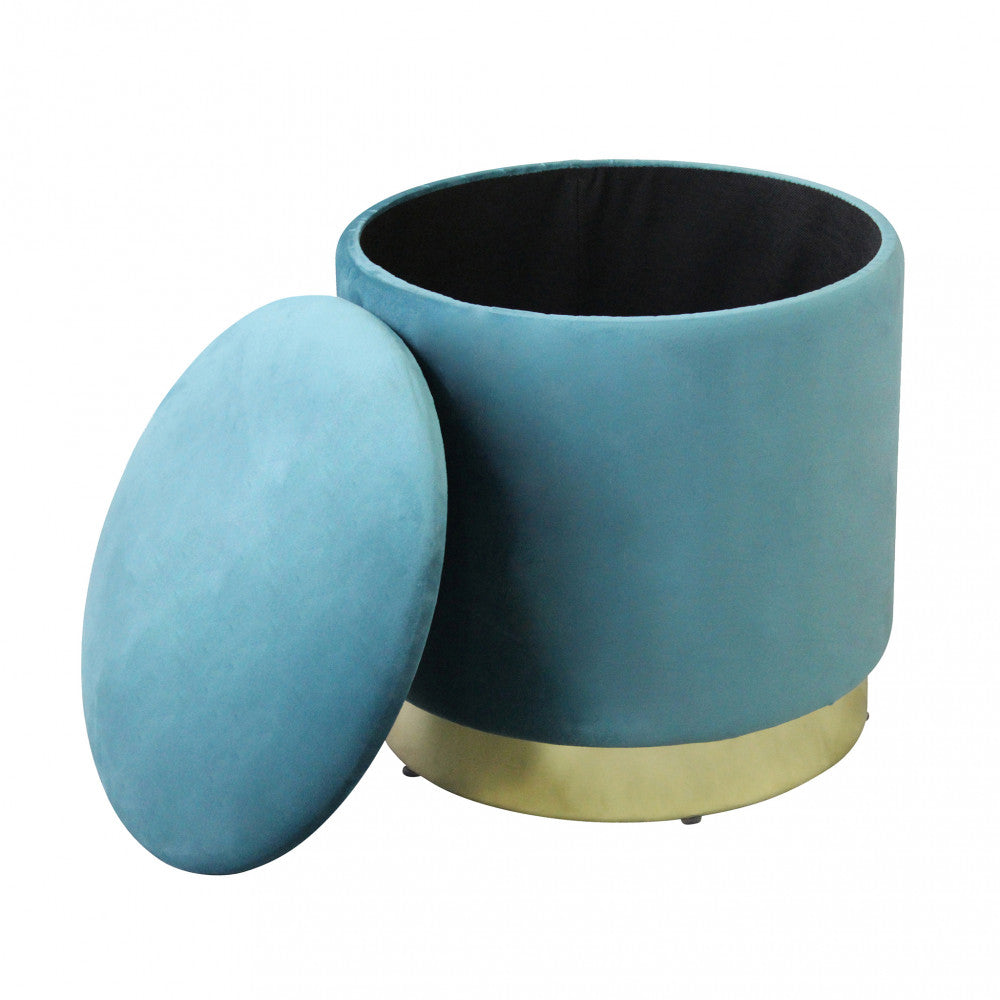 Pouf in velluto verde con coperchio sollevato, che mostra l'ampio vano contenitore interno nero.