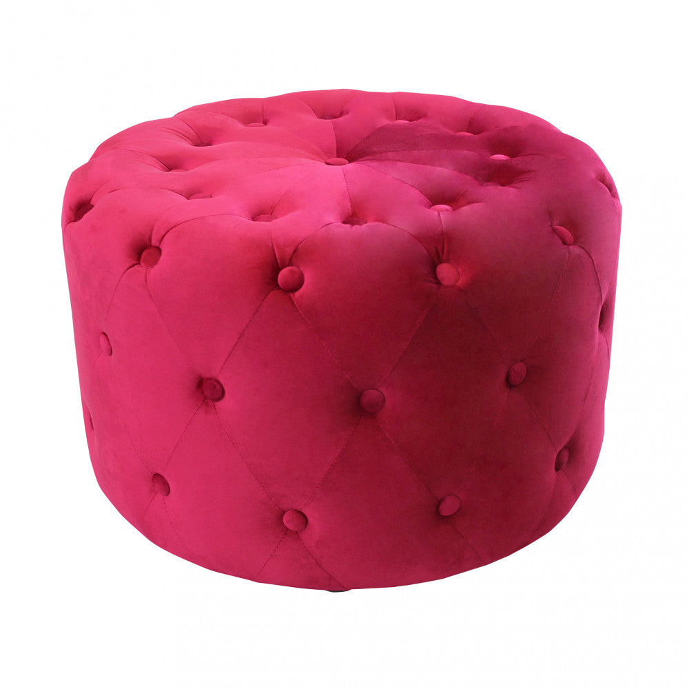 Angolazione leggermente rialzata del pouf rosso scuro, mostrando la simmetria della trapuntatura capitonné sulla seduta.