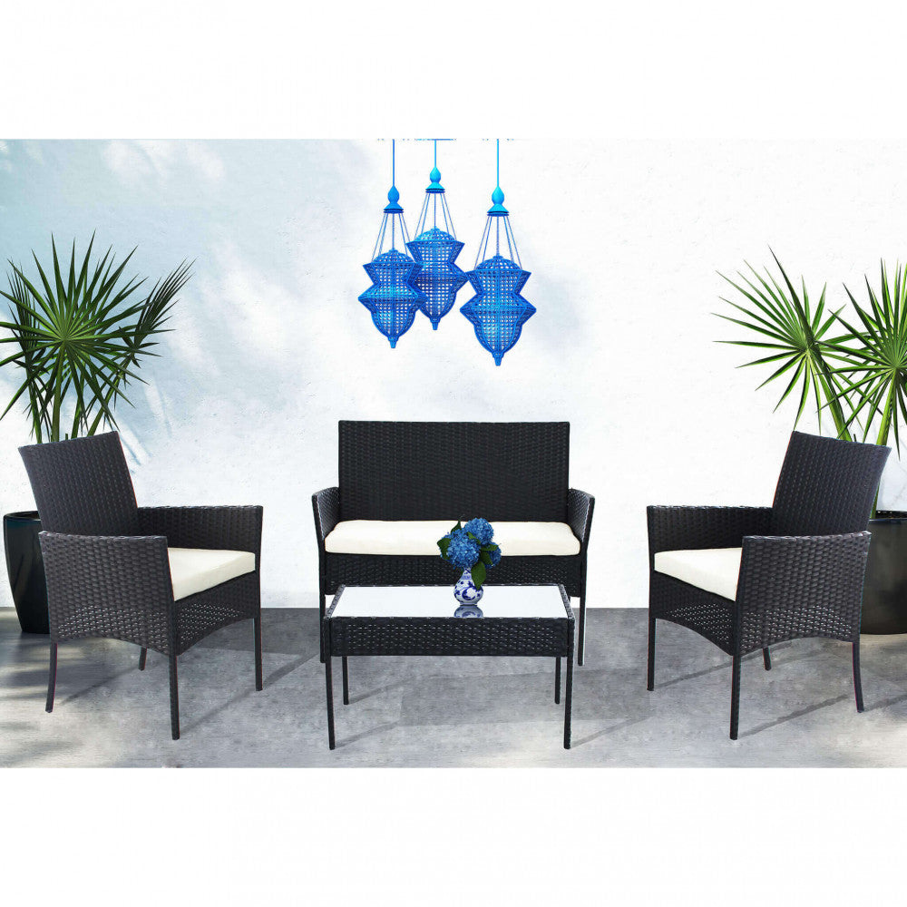 Il Salotto Caracas 2P completo, ambientato in un giardino, che mostra l'eleganza e la funzionalità per il relax all'aria aperta