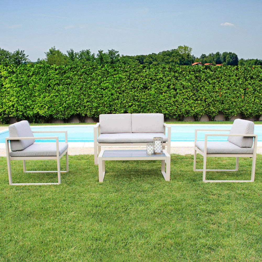 Salotto Formentera completo con struttura in alluminio bianco, cuscini in poliestere e tavolino in vetro