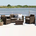 Il Salotto Nebraska 2P completo, ambientato in un giardino, che mostra l'eleganza e la funzionalità per il relax all'aria aperta.