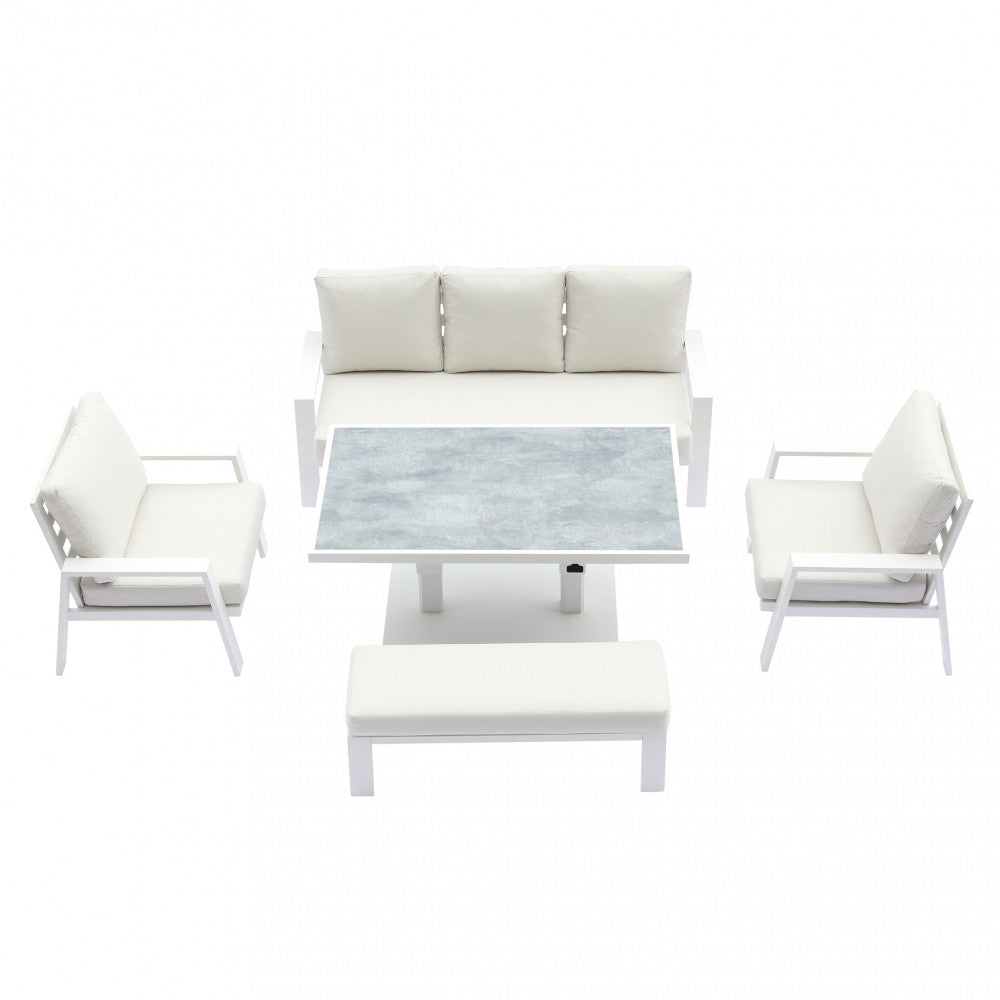 Salotto Rabat 3P con struttura in alluminio verniciato bianco e cuscini coordinati, in un ambiente esterno.