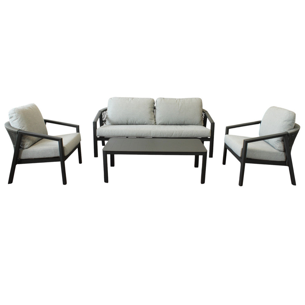 Vista frontale simmetrica del set lounge Tijuana con divano, poltrone e tavolino.