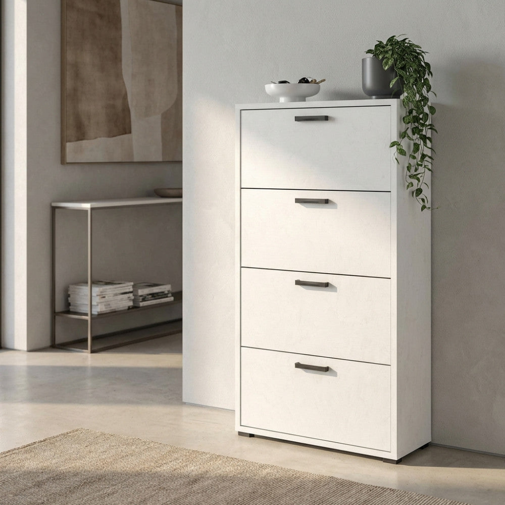 Scarpiera di design illuminata dalla luce naturale, decorata con una pianta a cascata in un corridoio elegante.