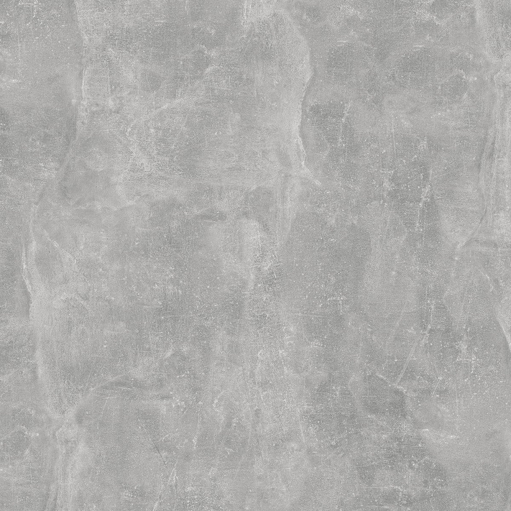 Dettaglio ravvicinato della texture materica in truciolare bilaminato grigio effetto cemento.