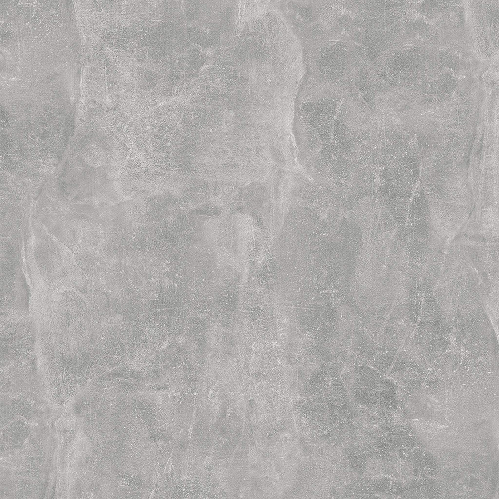 Dettaglio ravvicinato della finitura effetto cemento grigio, che evidenzia la texture tattile.