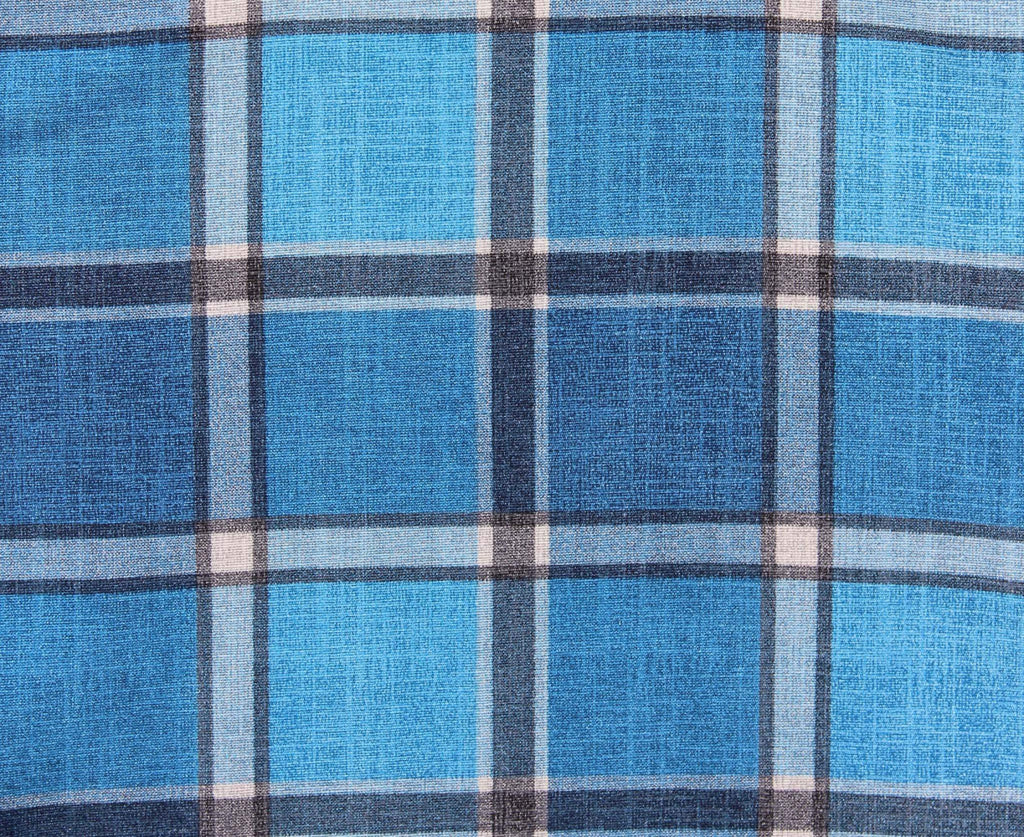 Texture del tessuto scozzese multicolor che evidenzia la qualità dei filati.
