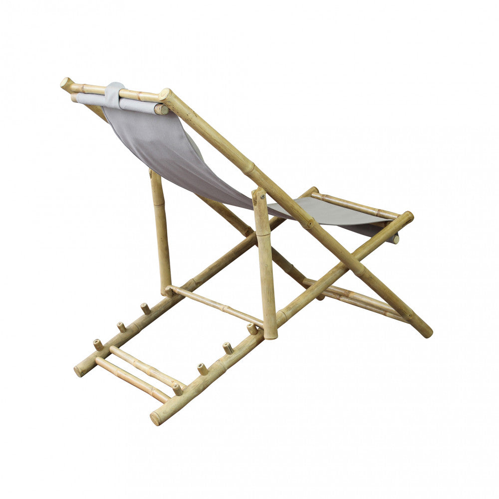 Sdraio dondolo Daiquiri posizionata in un giardino per momenti di relax.