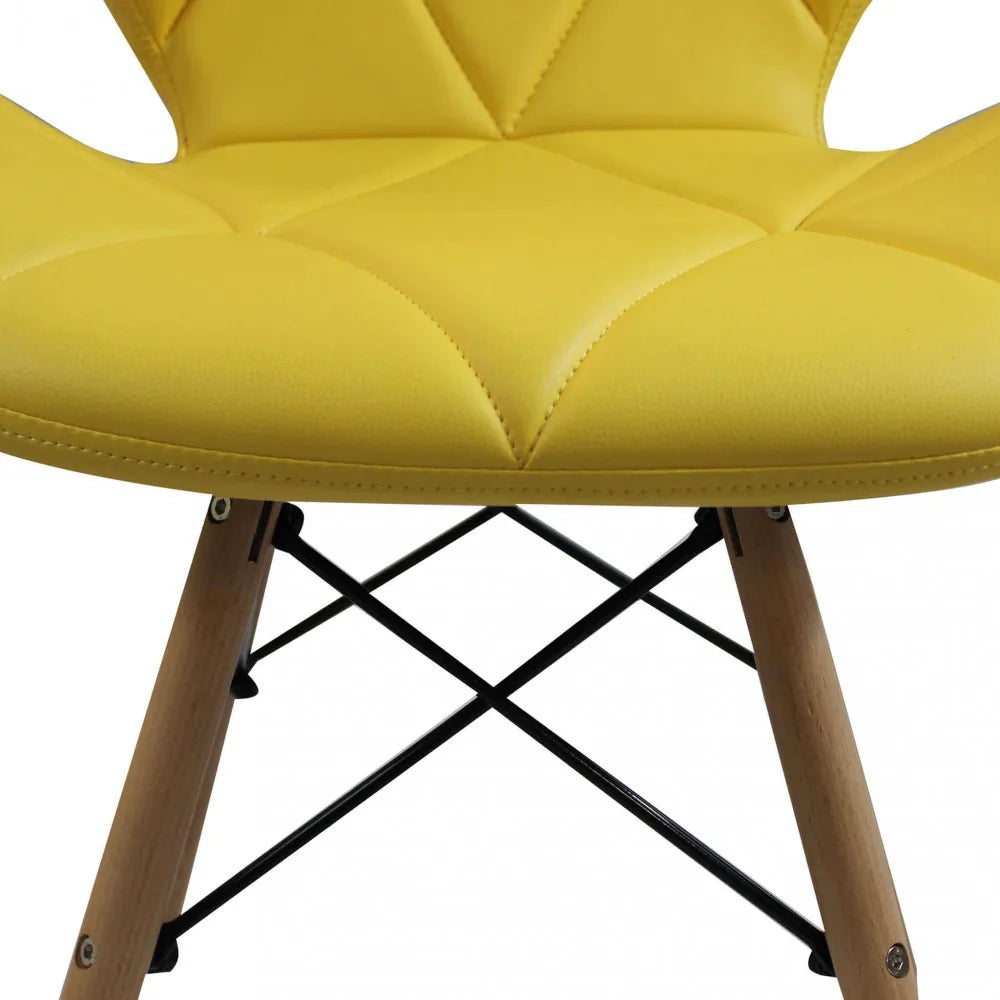 Sedia Annapolis gialla, imbottita in ecopelle con gambe in legno, stile moderno, particolare della seduta