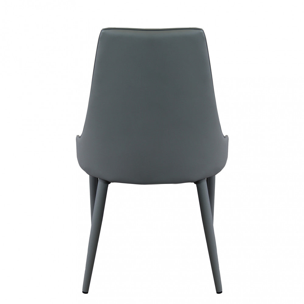 Vista posteriore della Sedia Camille, che mostra la continuità elegante del rivestimento in ecopelle grigio scuro.