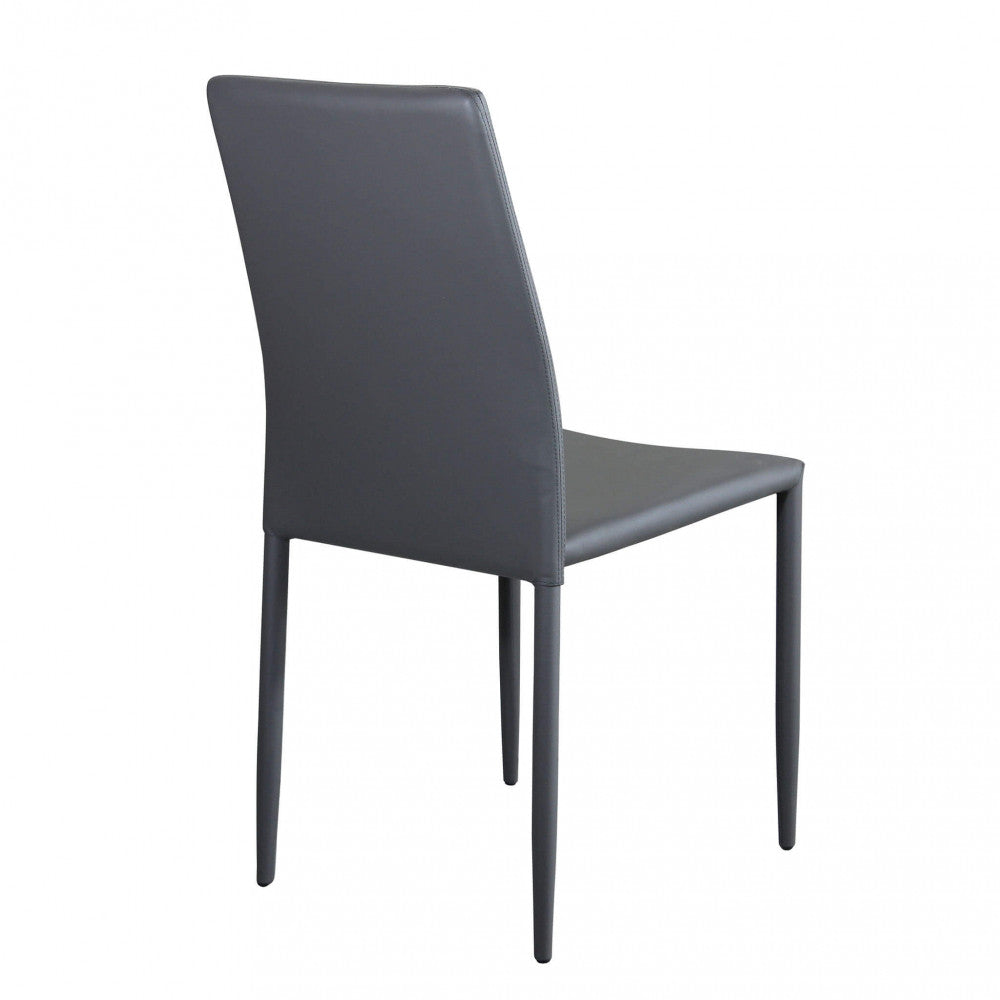 Vista posteriore di tre quarti della sedia da pranzo Cammie in grigio scuro.