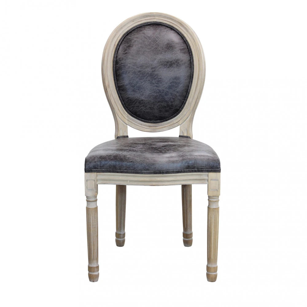 Sedia poltroncina Constance in ecopelle vintage grigio, schienale alto e gambe in legno, ideale per ambienti industrial o retrò chic, vista frontale