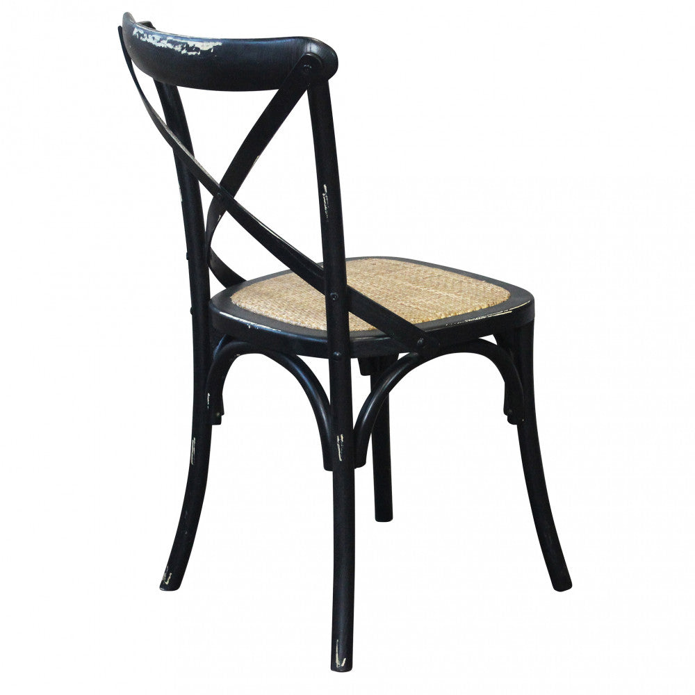 Vista di tre quarti posteriore della sedia Cross Nero che evidenzia la curvatura delle gambe.