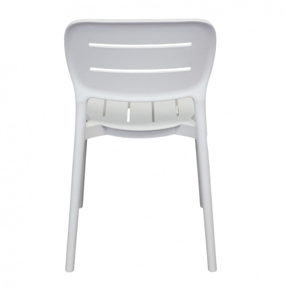 Vista posteriore completa della sedia Giselle, che illustra la simmetria perfetta e l'eleganza del design moderno.