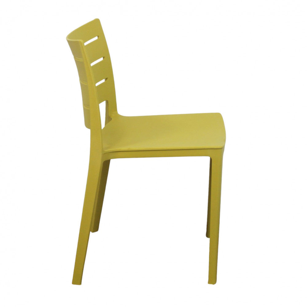 Sedia moderna gialla Hallie, vista laterale che evidenzia il profilo ergonomico su sfondo bianco.