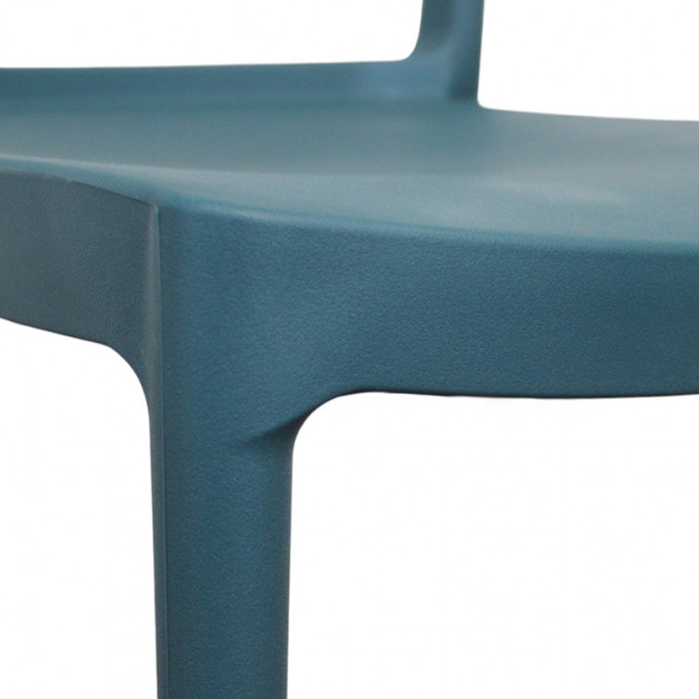 Dettaglio ravvicinato della seduta liscia e del profilo ergonomico della sedia Harmonie.