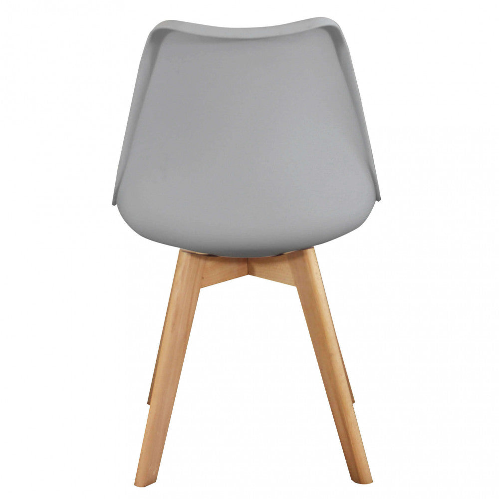 Vista posteriore della Sedia Marsiglia, rivelando la pulizia delle linee e l'innesto elegante delle gambe in legno.