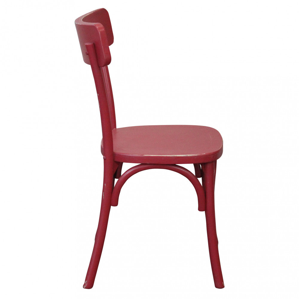 Profilo laterale della sedia Polly rossa, che mostra l'inclinazione ergonomica dello schienale.