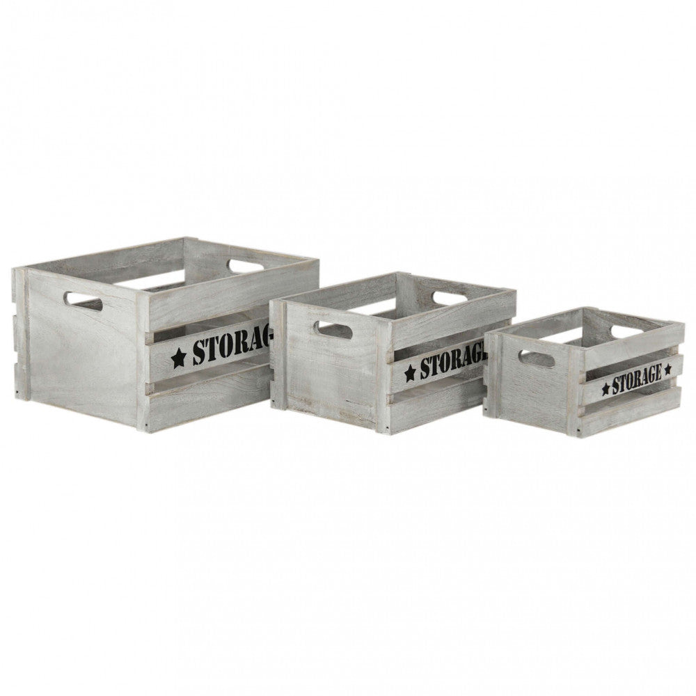 Le tre cassette in legno grigio Séline allineate su sfondo bianco, evidenziando le diverse dimensioni.