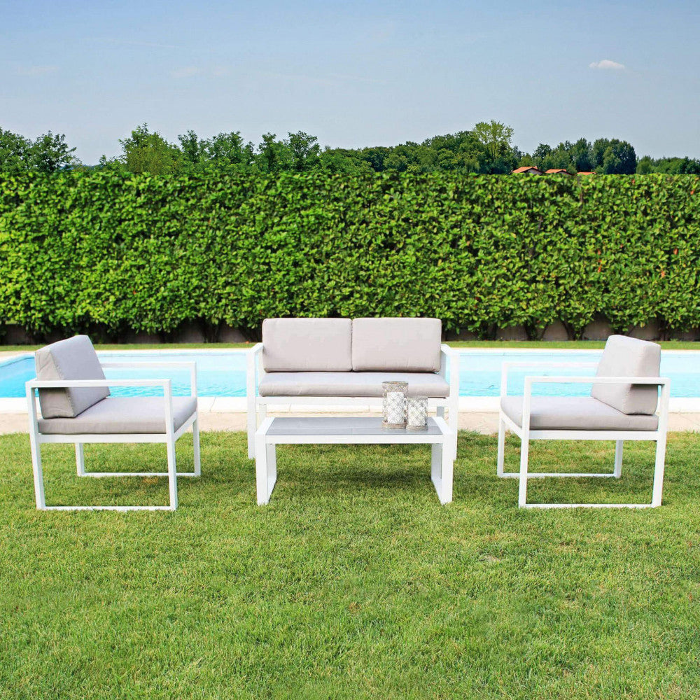 Salotto da Esterno Formentera 2 Posti completo con struttura in alluminio bianco, cuscini in poliestere e tavolino in vetro.